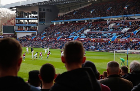 Aston Villa fans watch from the North Stand