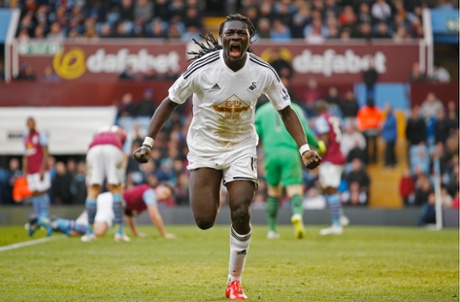 Bafetimbi Gomis celebrates scoring for Swansea