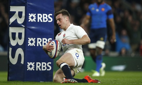 England s George Ford goes over.