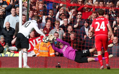 Wayne Rooney has a penalty saved by Simon Mignolet.