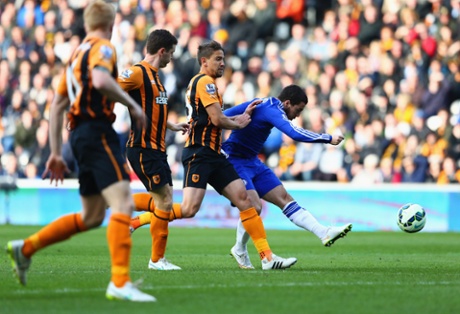 Eden Hazard of Chelsea beats the Hull City defence to score their first goal.