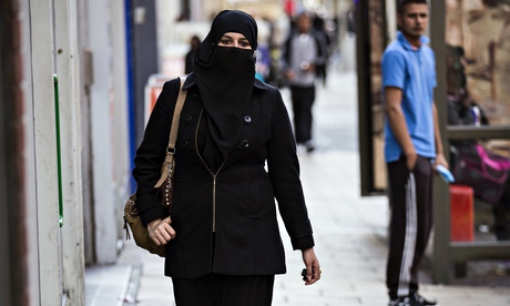 A woman wearing a veil in the UK
