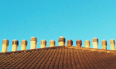 Chimneys line roof top