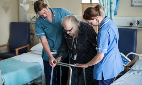 Elderly patient and two nurses