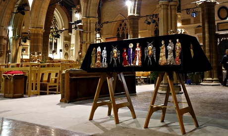 A crown sits on the coffin of King Richard III as it stands in Leicester Cathedral