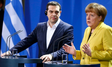 Angela Merkel and Alexis Tsipras address a news conference following talks in Berlin