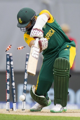 The bails are lit up and South Africa's Hashim Amla is heading back to the pavillion.
