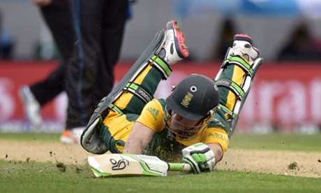 South African captain AB de Villiers eats dirt as he dives back to the crease and avoids being run out.