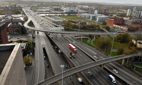 Kingston Bridge in Glasgow. The CCC suggests lower speed limits and congestion charges to reduce road traffic in Scotland.