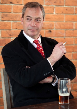 Nigel Farage with a cigarette and a pint of beer in a break during the 2013 Eastleigh by-election campaign.