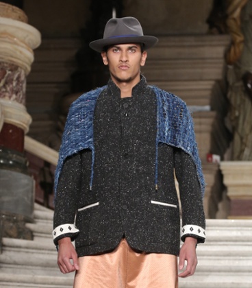 A model at the Piaglle menswear autumn/winter 2015-2016 show