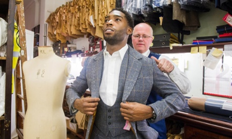 Tinie Tempah models a tweed suit before the Men's Collections