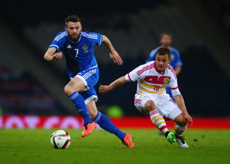 Stuart Dallas evades Shaun Maloney.