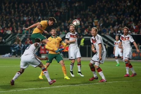 Nathan Burns directs a header on the German goal.