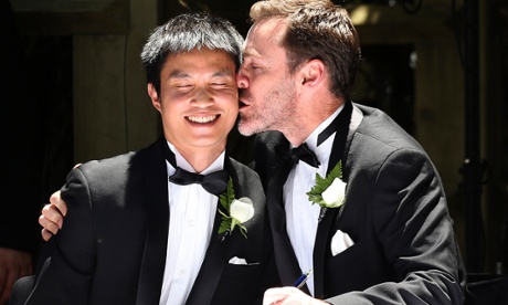 Ivan Hinton, right, gives his partner Chris Teoh a kiss after taking their wedding vows during a ceremony at Old Parliament House in Canberra in December 2013, Australia. The law allowing gay marriage was quickly struck down by Australia's high court.