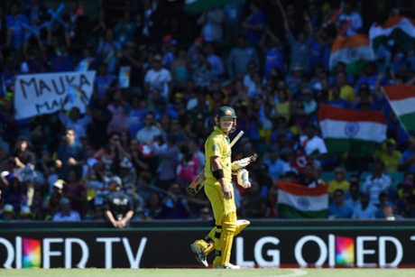 Warner makes the long walk back to the pavillion.