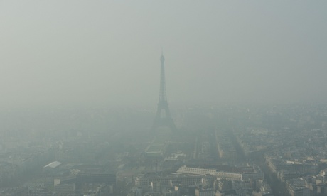 Eiffel Tower shrouded in smog.