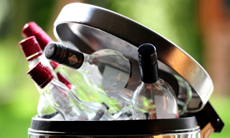 Alcohol bottles in dustbin