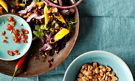 This deliciously refreshing peanut salad looks stunning with the contrast of the black rice and orange mango.