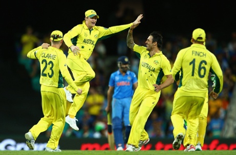 Steve Smith of Australia celebrates with team-mates after running out Ravindra Jadeja.