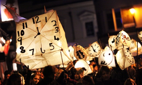 Revellers take part in the annual Burning the Clocks Winter Solstice Parade through the streets of Brighton.