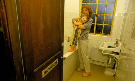 homeless woman and child in bathroom