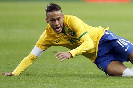 Neymar goes down.
