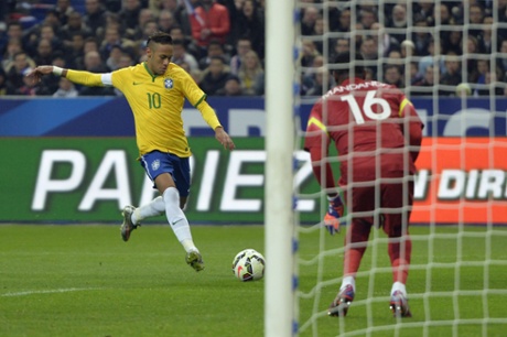 Neymar strikes on his way to score.