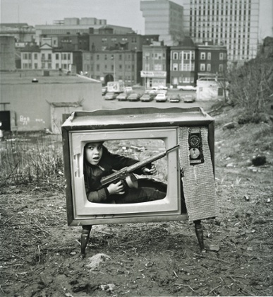 Violence from around the world is brought to us by the media, which makes the photograph still relevant' … Boy in TV Set, Boston, 1972.