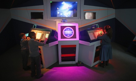 Children from St Joseph's School, Nottingham, try out Mission Control one of the new computer games at the arcade.