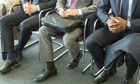 Businessmen sitting in waiting area