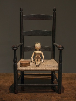 From her wooden sleep