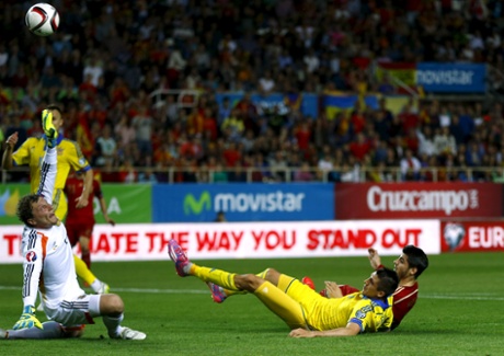 Spain's Alvaro Morata scores past Ukraine's goalkeeper Andriy Pyatov.