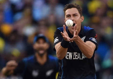 New Zealand bowler Trent Boult takes a catch off his own bowling to dismiss Australian batsman Aaron Finch.