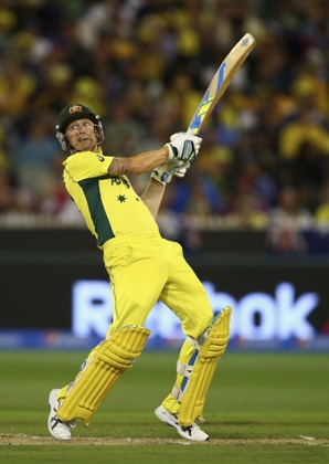 Michael Clarke pushes Australia's total onwards.