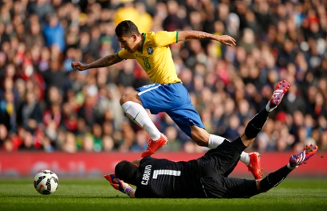 Roberto Firmino scores the first goal for Brazil.