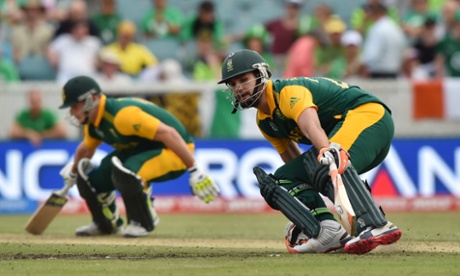 South Africa's David Miller and Rilee Rossouw) run between the wickets during the matchagainst Ireland.