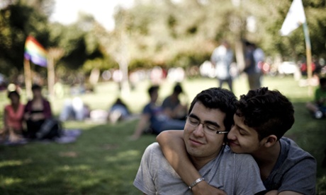 A gay couple takes part in a Valentine's Day celebration in Balmaceda Park in Santiago, Chile.