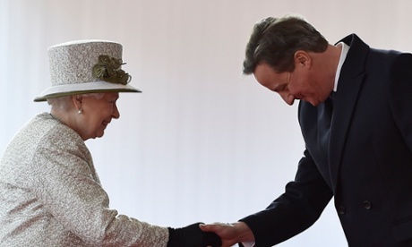David Cameron bows as he greets the Queen.
