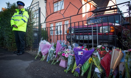 Flowers have been left outside the Watts' family home.