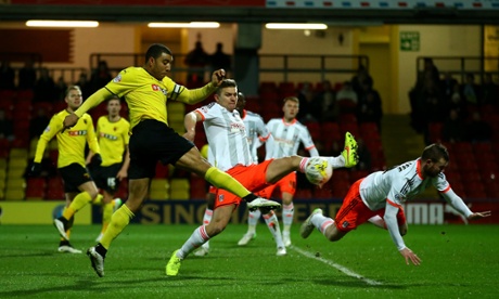 Watford's Troy Deeney thumps home the opener.