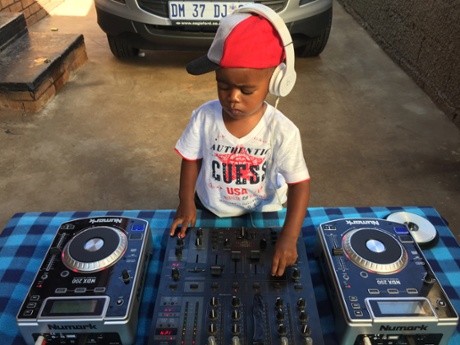 DJ Arch Jr, aged 2, mixes the decks