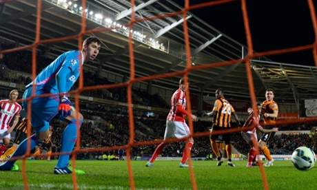Dame N'Doye, centre, scores the first goal for Hull.