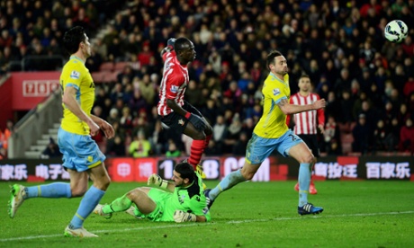 Sadio Mane of Southampton lifts the ball over Crystal Palace keeper Julian Speroni to score.