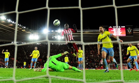 Sadio Mané of Southampton lifts the ball over Crystal Palace goalkeeper Julian Speroni to score the only goal of their Premier League match at St Mary’s.