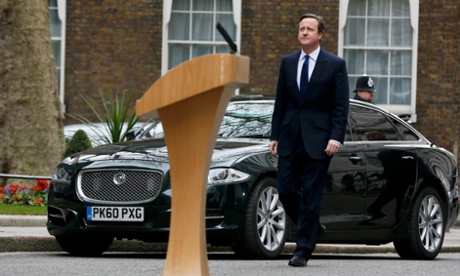 Britain's Prime Minister David Cameron returns to Number 10 Downing Street, after meeting the Queen.