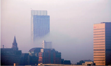 Beetham Tower peeping out of the dawn mist on the Manchester city centre skyline.