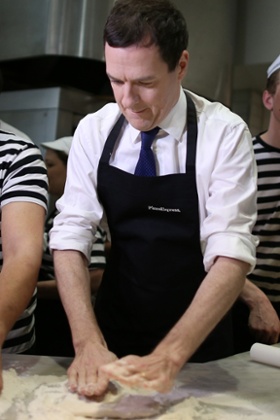 George Osborne kneading dough.