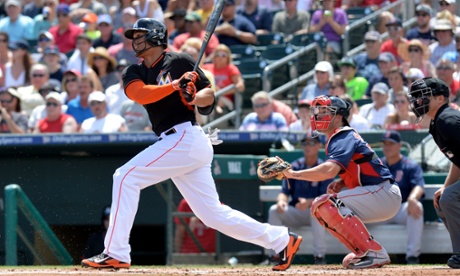 Miami Marlins right fielder Giancarlo Stanton will wear a protective face guard in 2015.