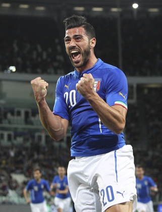 Graziano Pelle is rather pleased with giving Italy the lead.